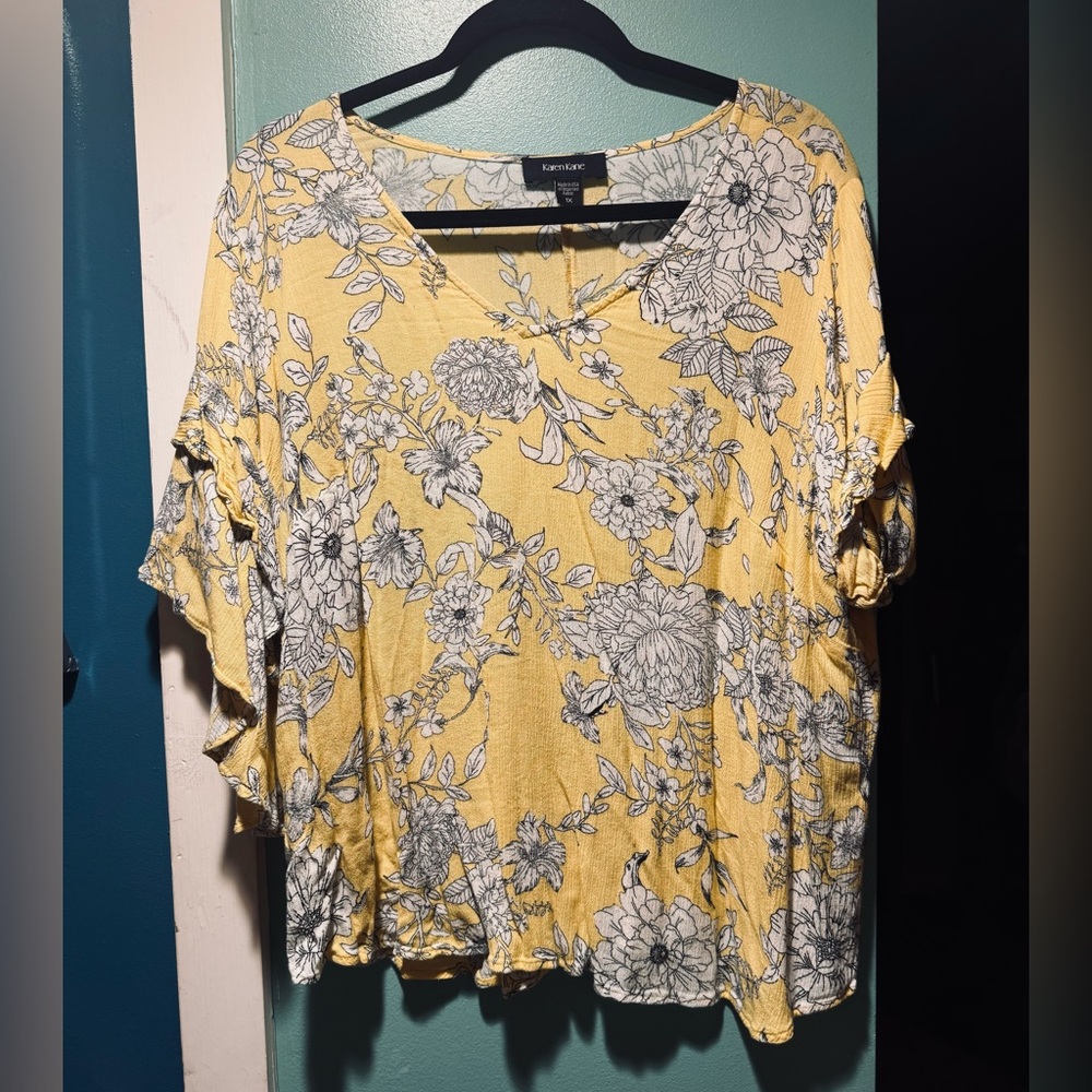 Yellow floral top.